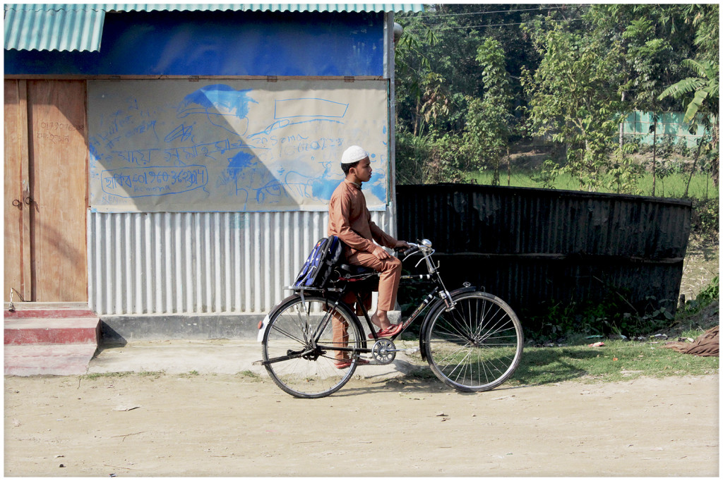 Man with bike next to the railway station on our way to Srimangal