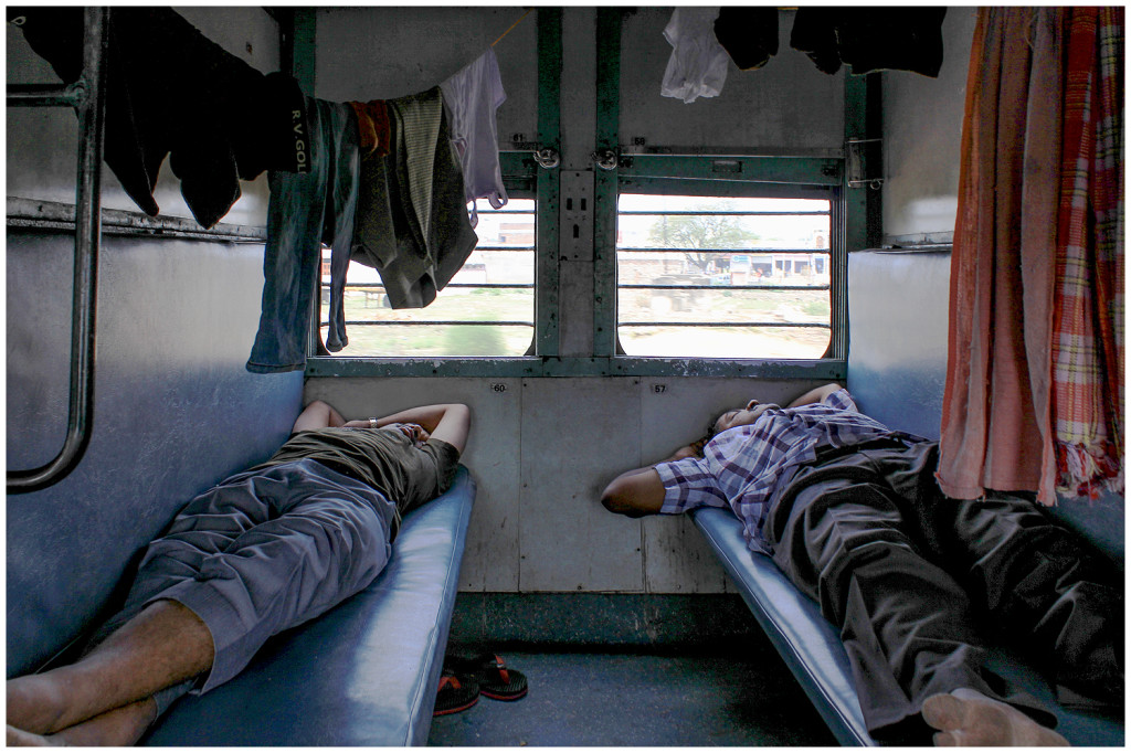 Two men sleeping in the train on the way to Jaipur