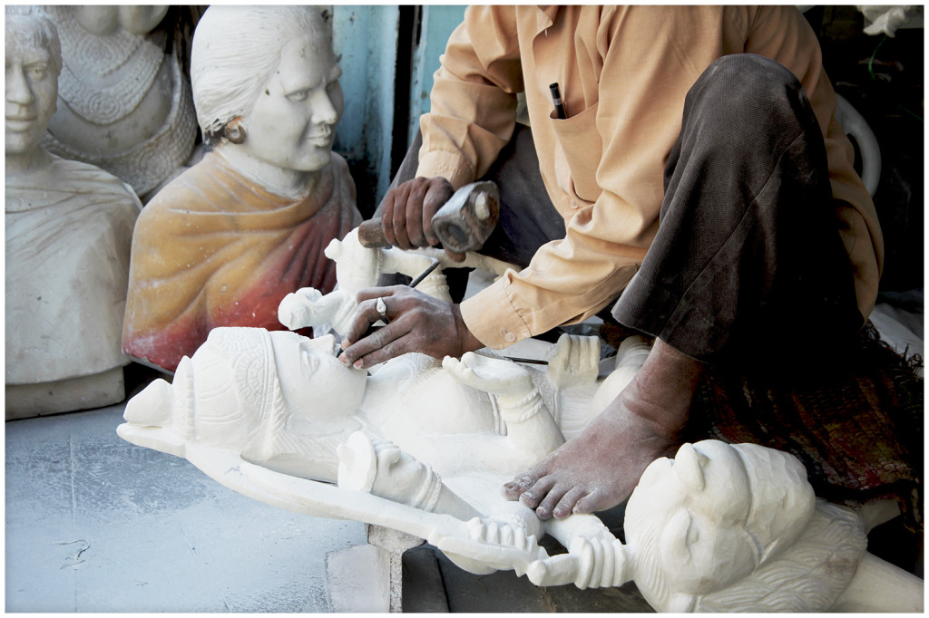 Sculptor making an image of a god