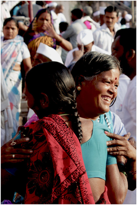 Women dancing together.